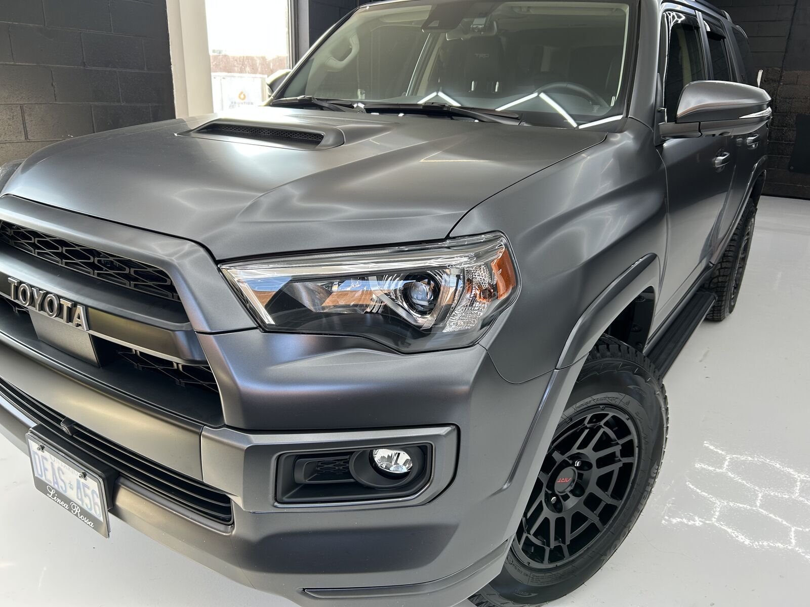 Close-up of a protected Toyota grille at Perfection Auto Spa